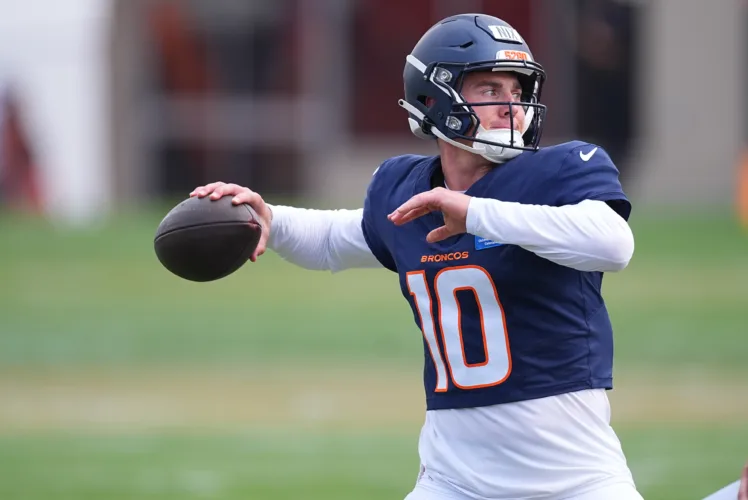 Bo Nix takes hits in a fiery Broncos practice